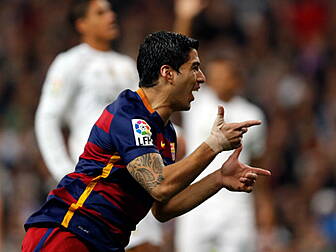 Suarez shines as Barcelona dis...